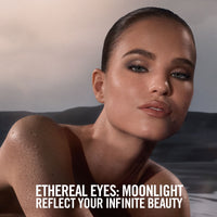 A women with a beautiful eyeshadow look coming out of water featuring the new Ethereal Eyes Eyeshadow Palette: Moonlight.