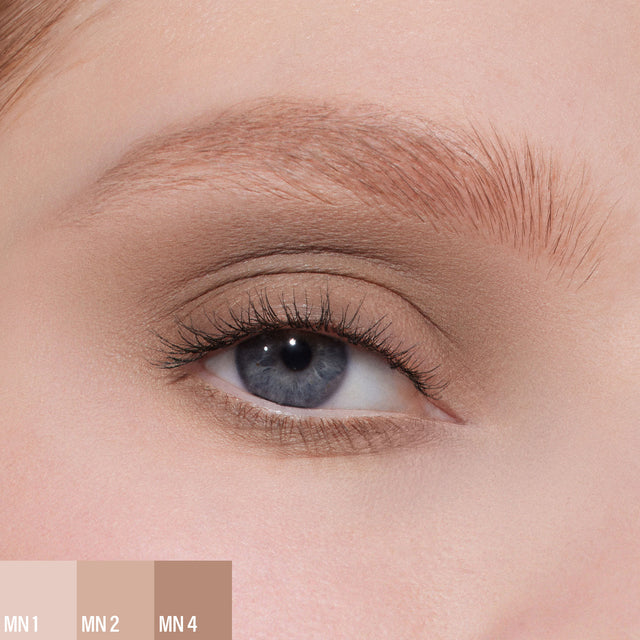 A female wearing three shades of the 
Master Mattes® Eyeshadow Palette: The Neutrals. 