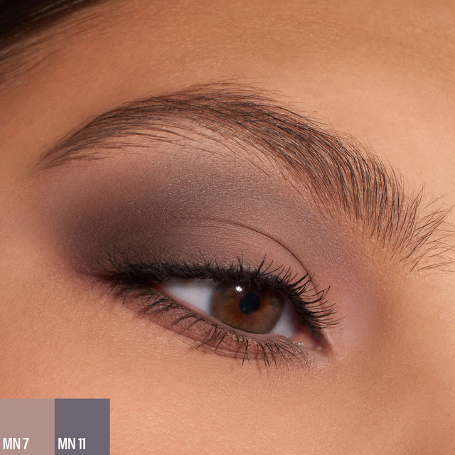 A female wearing two shades of the 
Master Mattes® Eyeshadow Palette: The Neutrals. 
