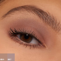 A female wearing two shades of the 
Master Mattes® Eyeshadow Palette: The Neutrals. 