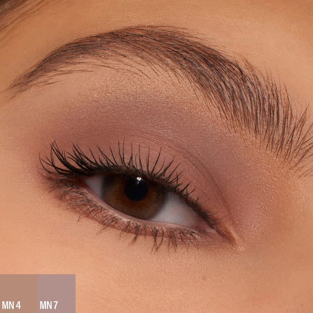 A female wearing two shades of the 
Master Mattes® Eyeshadow Palette: The Neutrals. 