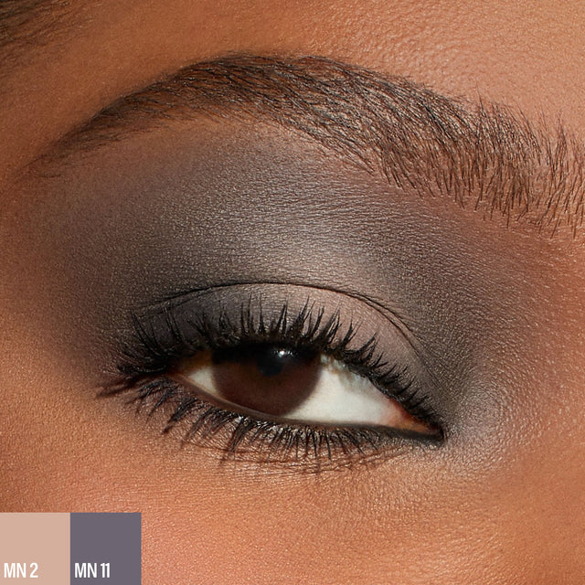 A female wearing two shades of the 
Master Mattes® Eyeshadow Palette: The Neutrals. 