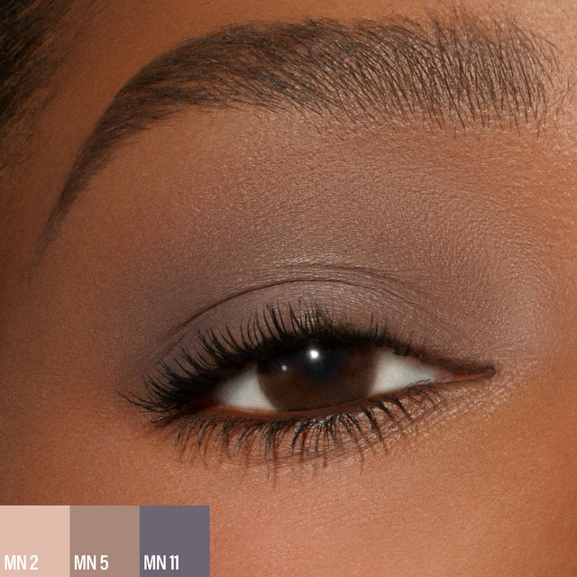 A female wearing three shades of the 
Master Mattes® Eyeshadow Palette: The Neutrals. 