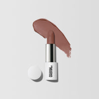 Product Shot with Color Swatch behind it of Ultra Suede® Lipstick by Makeup By Mario in shade Jesse (Pink Mauvy Brown)