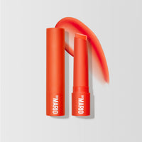 Front view of the MoistureGlow™ Plumping Lip Serum in shade Tangerine Glow.