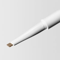 Close up image of the tip of the Master Blade® Brow Pencil in shade Blonde. 