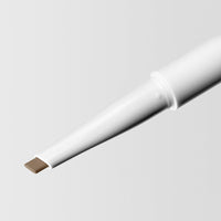 Close up image of the tip of the Master Blade® Brow Pencil in shade Dirty Blonde. 