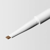 Close up image of the tip of the Master Blade® Brow Pencil in shade Light Brunette. 