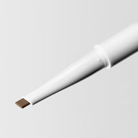 Close up image of the tip of the Master Blade® Brow Pencil in shade Classic Brunette. 