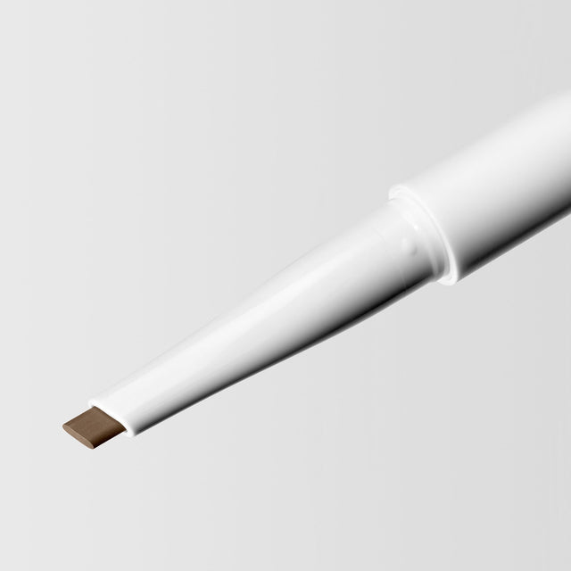 Close up image of the tip of the Master Blade® Brow Pencil in shade Classic Brunette. 