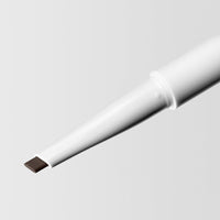 Close up image of the tip of the Master Blade® Brow Pencil in shade Brown Black. 