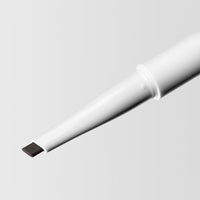 Close up image of the tip of the Master Blade® Brow Pencil in shade Almost Black. 