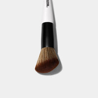 Top part of the F1 Dual-Ended Contour and blush brush. 