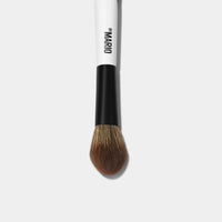 Smaller side of the F3 Dual-Ended Precision Powder Brush to be used with blush and highlighter.  