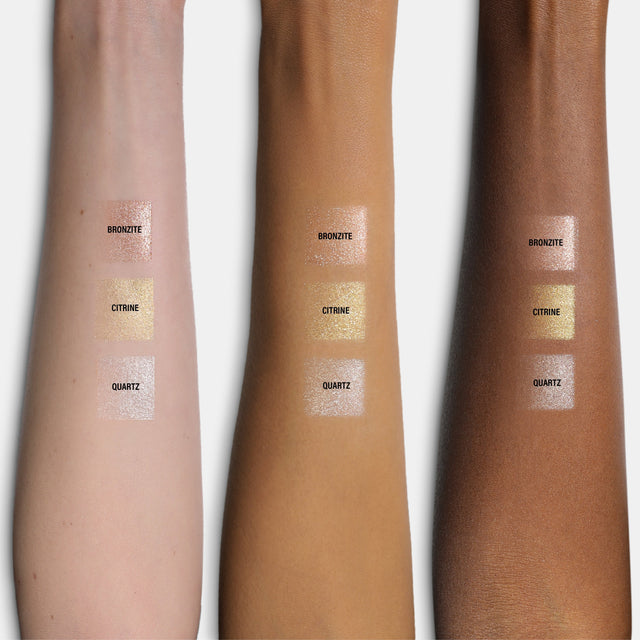 Arm swatch of all three shades of the Master Crystal Reflector® on three different skin tones.